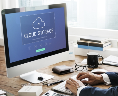 employee using cloud storage for business data to prevent data loss