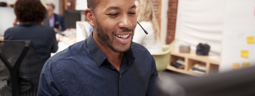 man working on computer at work