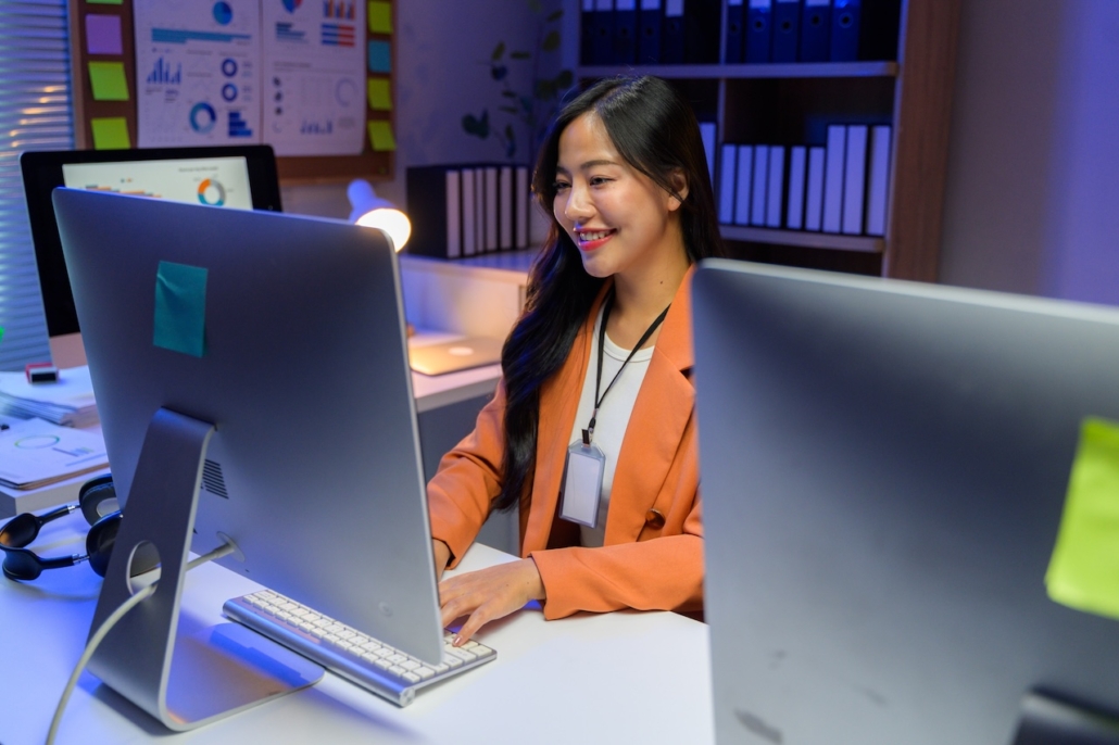 woman working in office on computer