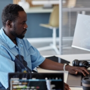 man working on computer in office