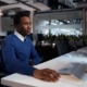 male employee working on computer in modern office